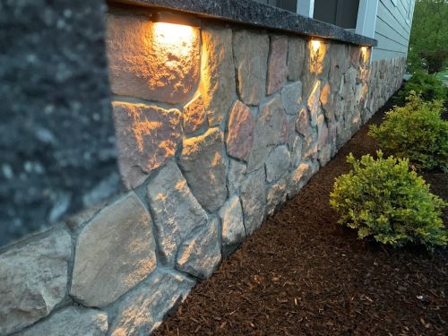  alt='Highly recommend Darwin and his crew. We wanted some rock along our driveway and landscaping in the front yard by the road'