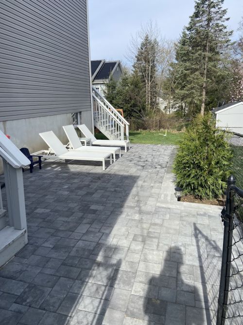  alt='We recently hired Big Heart Landscaping for a gas fire pit, paver patio, planting, shed foundation, and lattice'
