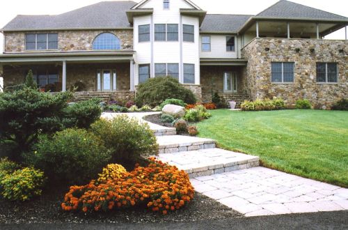  alt='Hired them to do my mulching, edging, pruning, planting of 4 trees, and also a stone wall and bluestone front walkway'